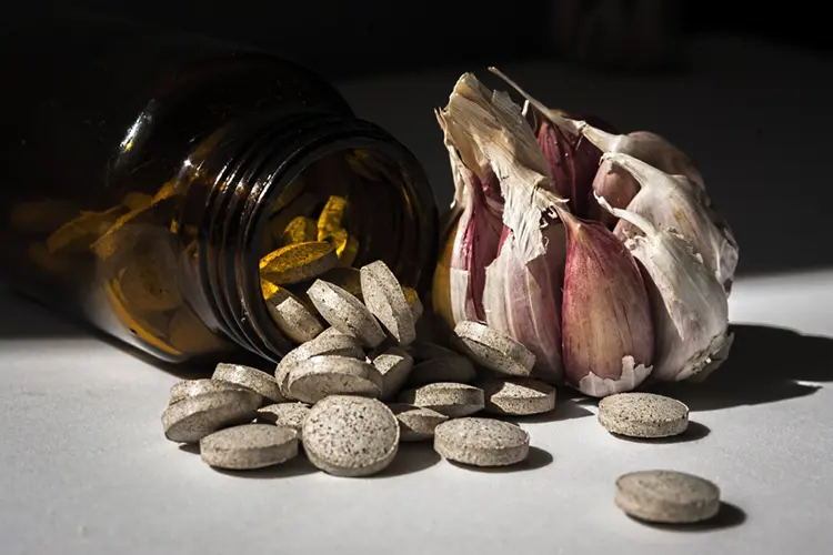 Garlic supplement capsules for gut health and IBS