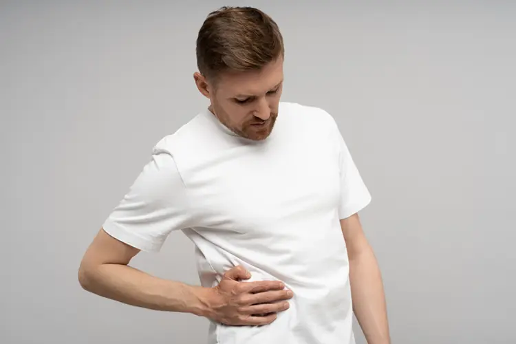 Man with IBS abdominal pain — IBS symptoms in men